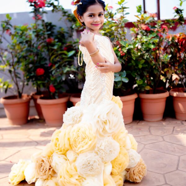 Elegance Captured: The Stunning Yellow Floral Tail Gown